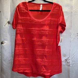 NWT Classic tee from LuLaRoe. Size Large